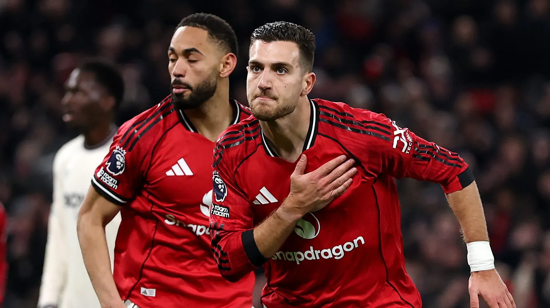 MANCHESTER, ENGLAND - DECEMBER 04: Diogo Dalot of Manchester United celebrates scoring his team's first goal during the Premier League match between Manchester United and West Ham United at Old Trafford on December 04, 2025 in Manchester, England. (Photo by Justin Setterfield/Getty Images)