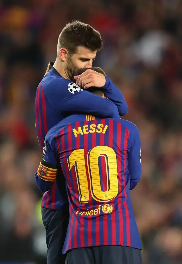 Piqué juntamente com Messi. Foto: Catherine Ivill/Getty Images.