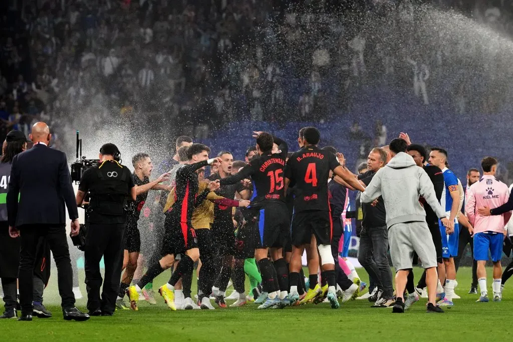 A celebração dos jogadores, após a confirmação da conquista do campeonato. Foto: Alex Caparros/Getty Images.