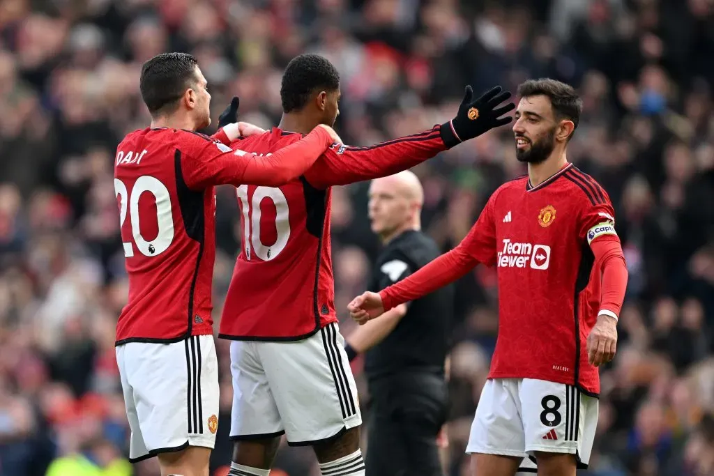Diogo Dalot e Bruno Fernandes celebram um golo do Manchester United. Foto: Michael Regan/Getty Images)