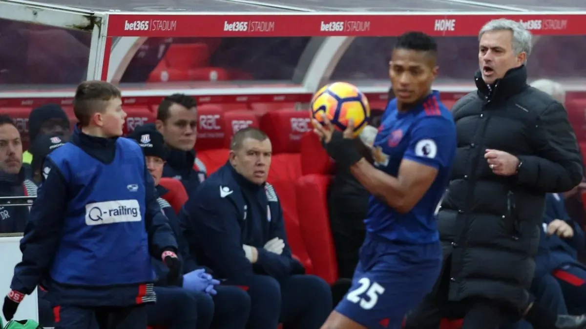 Jose Mourinho argues with a Stoke City ball boy while managing Manchester United.