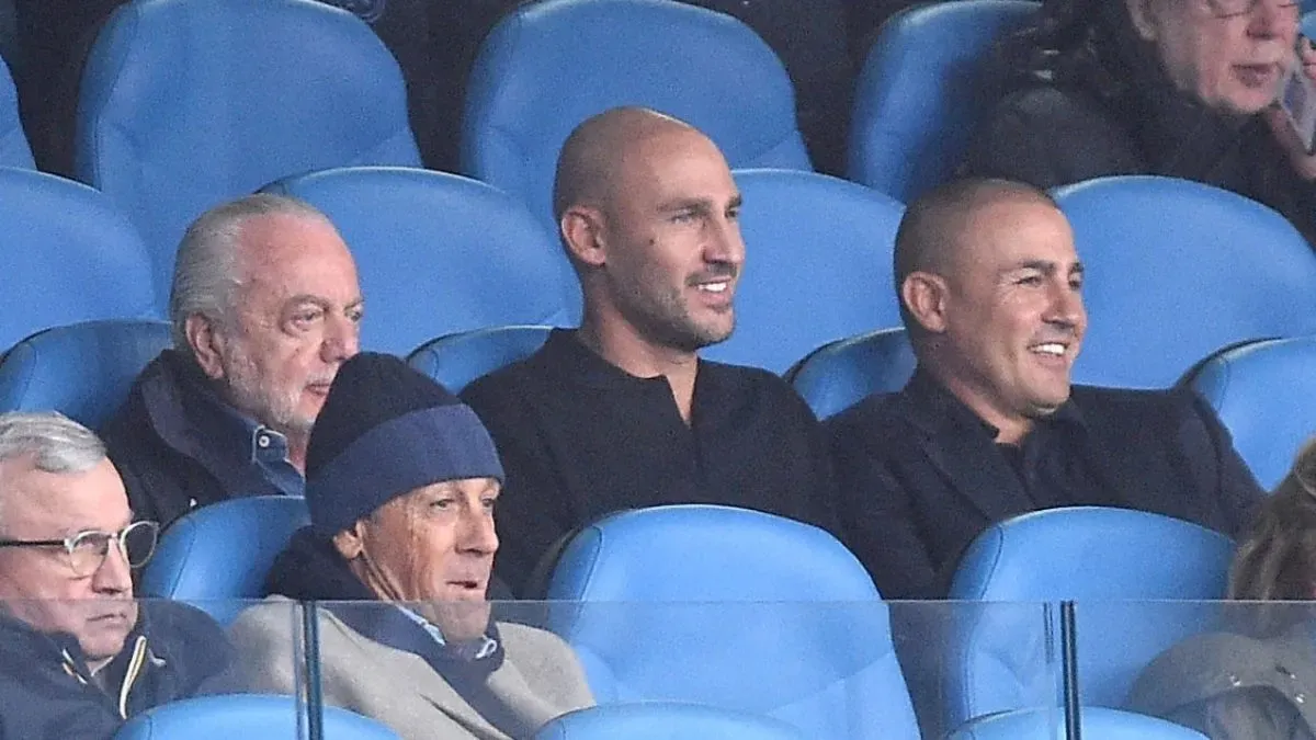 Fabio Cannavaro, pictured here with his brother Paolo, has been spotted in the President’s box with Aurelio de Laurentiis.