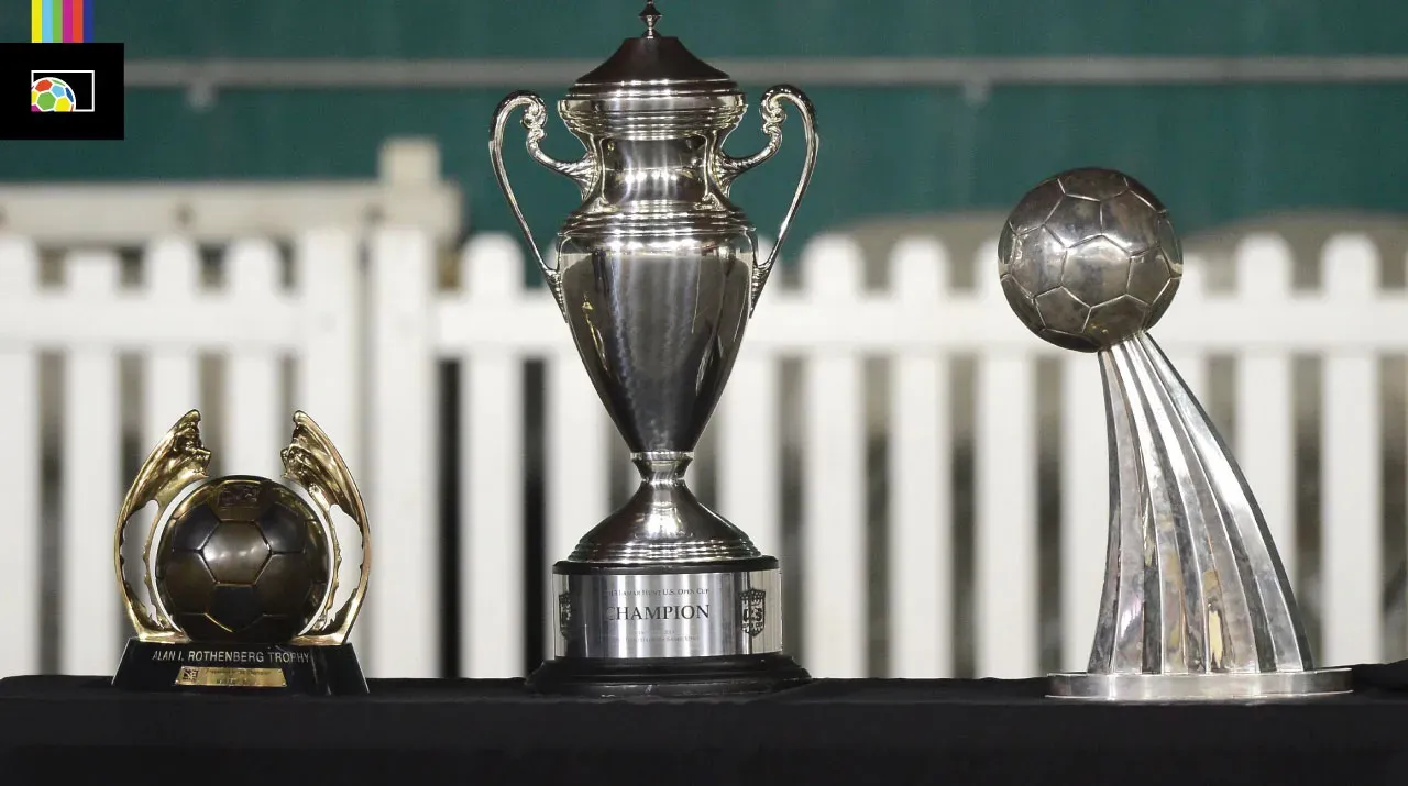 The original Rothenberg trophy designs (L and R) along with the current U.S. Open Cup trophy (center)