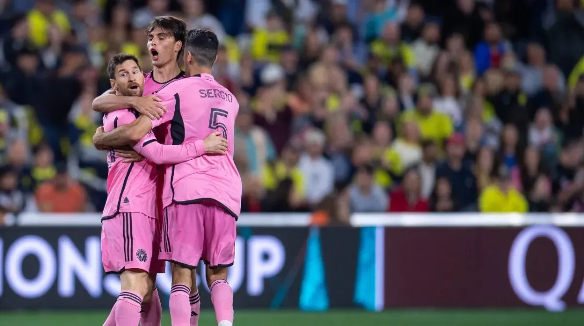 Federico Redondo celebrates with Inter Miami teammates Lionel Messi and Sergio Busquets. Inter Miami tied this game with Nashville in a 2-2 draw in the CONCACAF Champions Cup.