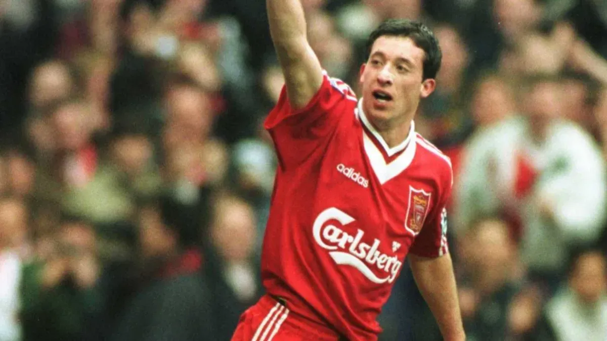 Robbie Fowler of Liverpool celebrates scoring the third goal against Aston Villa during the Premiership game in 1996. (Source: Ben Radford/Allsport)