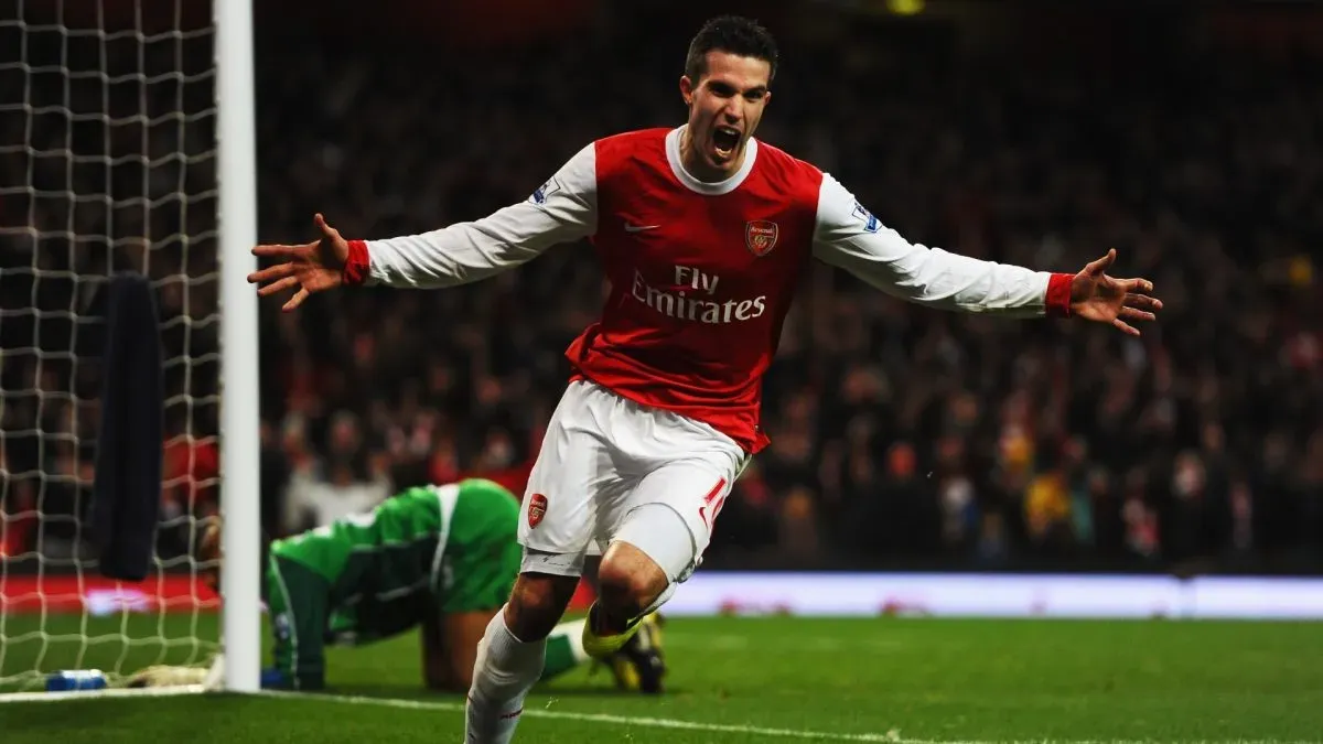 Robin Van Persie of Arsenal celebrates scoring his third goal in a hat trick during the Barclays Premier League match between Arsenal and Wigan Athletic on January 22, 2011. (Source: Mike Hewitt/Getty Images)