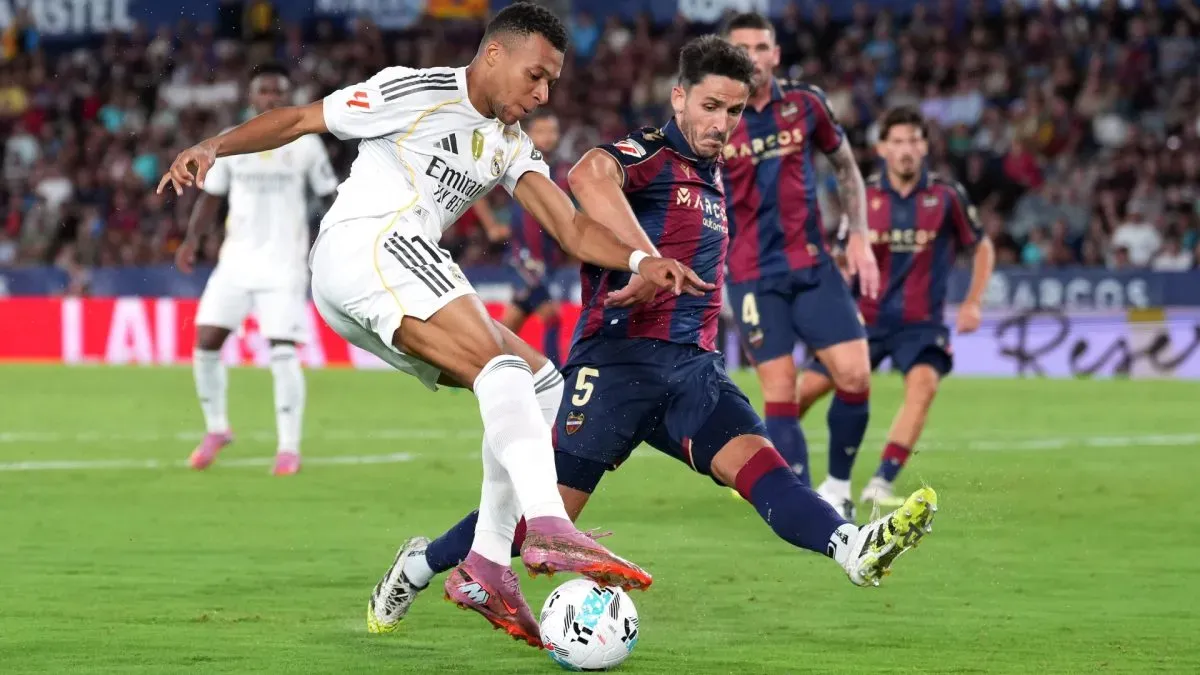 Kylian Mbappe of Real Madrid is fouled by Unai Elgezabal of Levante UD in the box during the LaLiga EA Sports match.