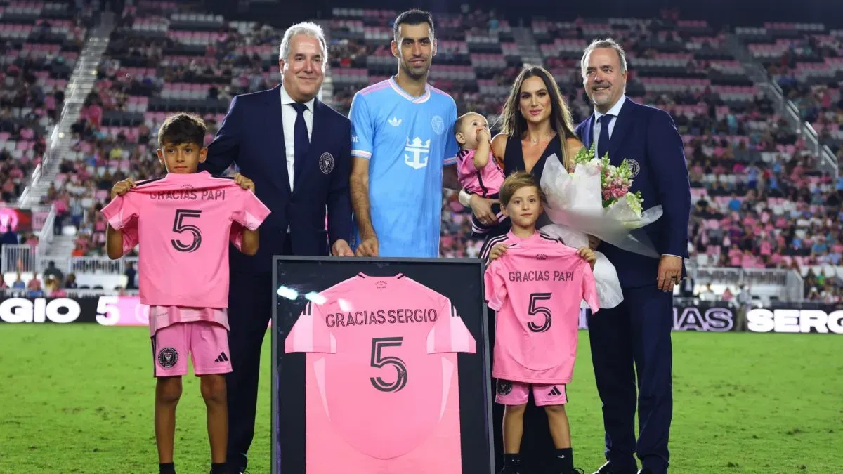 Sergio Busquets #5 of Inter Miami CF poses with his family and owners of Inter Miami CF, Jorge Mas and Jose Mas, during his retirement ceremony from Inter Miami CF.