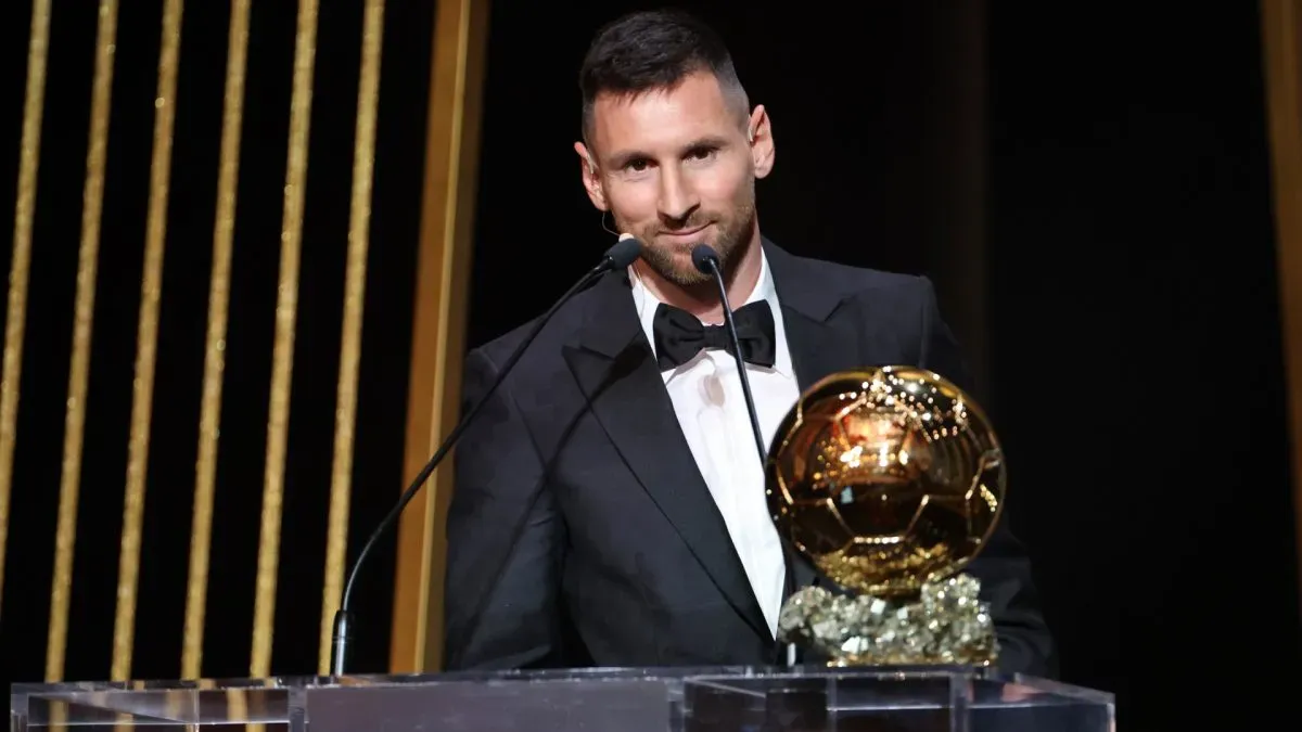 Lionel Messi holding a Ballon d'Or