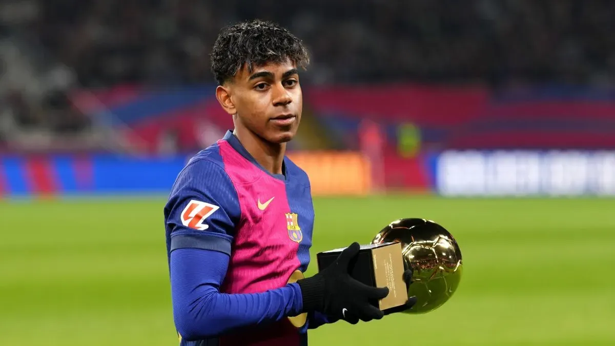 Lamine Yamal of FC Barcelona is presented with the Golden Boy 2024 award.