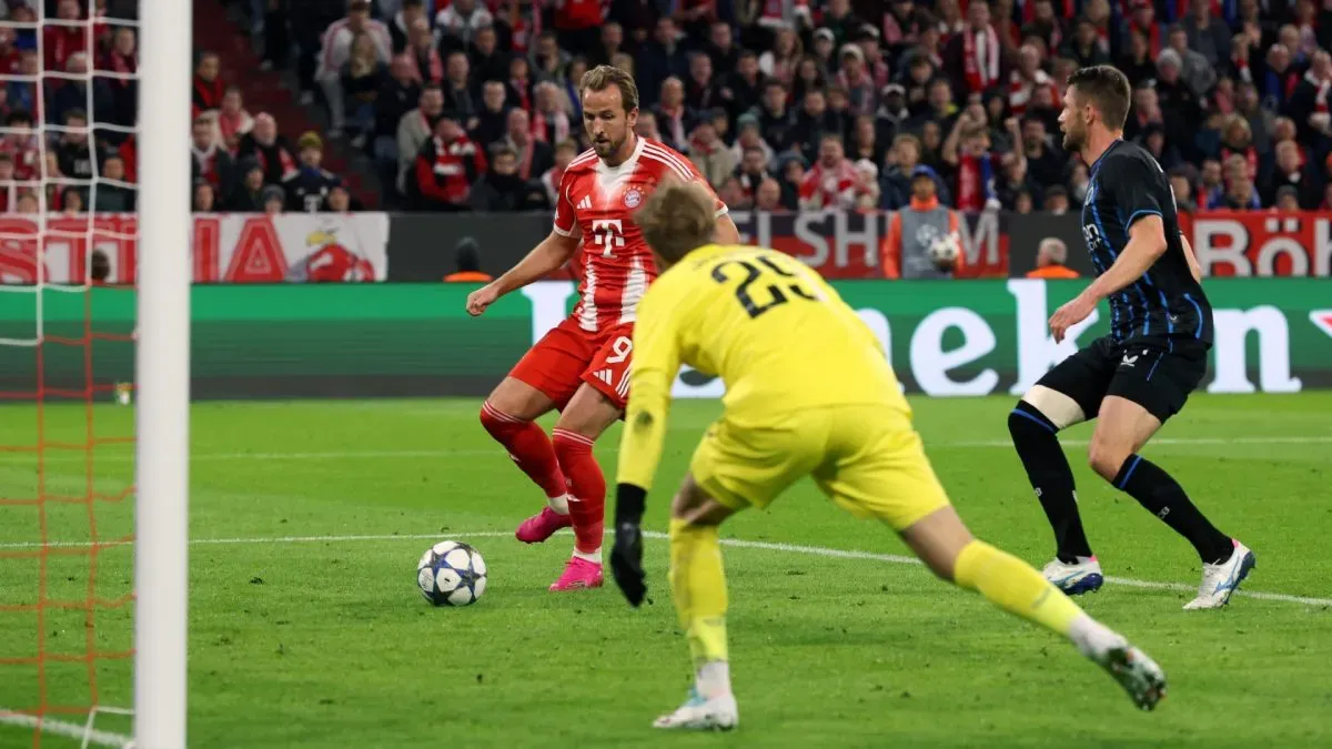 Harry Kane of Bayern Munich scores his team's second goal against Club Brugge.