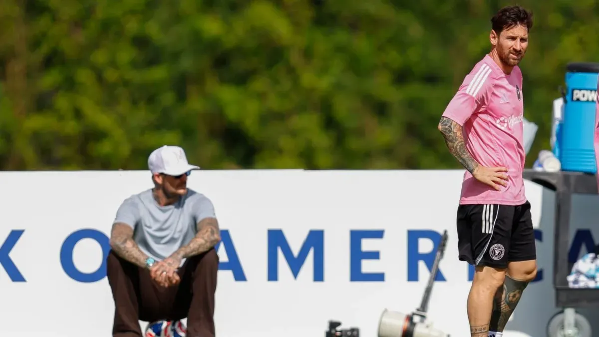 Co- Owner David Beckham of Inter Miami CF looks on as Lionel Messi trains.