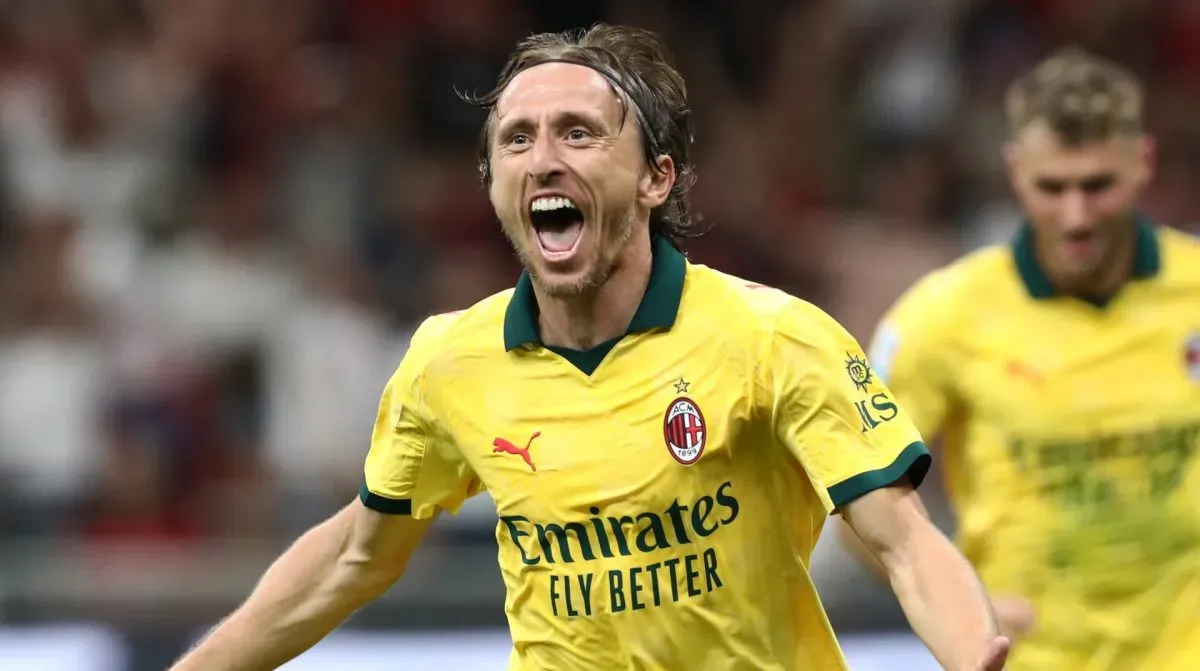 Luka Modric of AC Milan celebrates scoring his team's first goal during the Serie A match between AC Milan and Bologna FC 1909 at Giuseppe Meazza Stadium on September 14, 2025 in Milan, Italy.