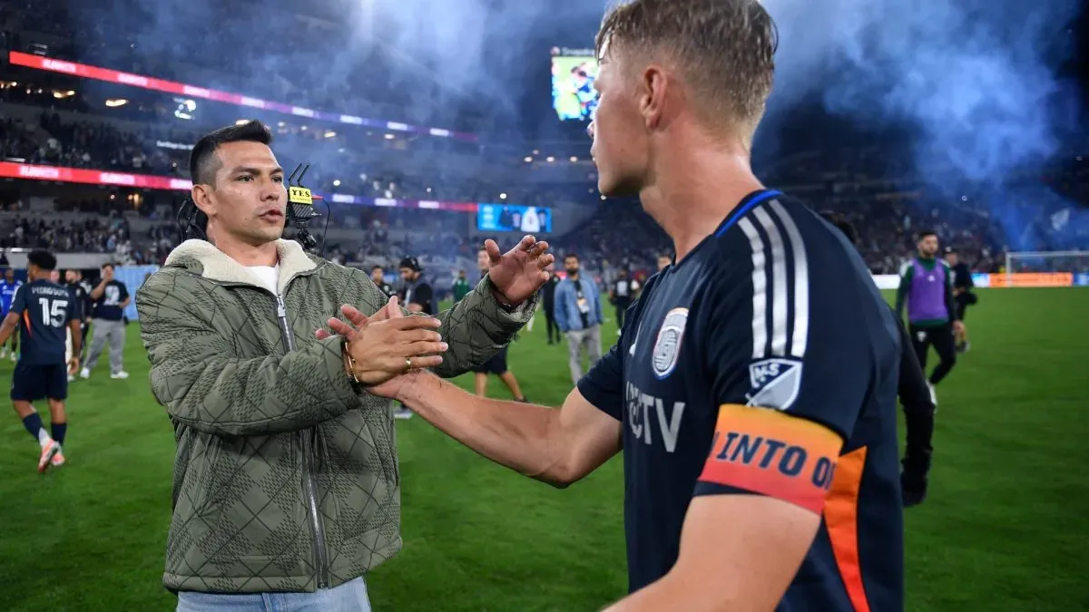 Hirving Lozano #11 and Jeppe Tverskov #6 of San Diego FC shaking hands.