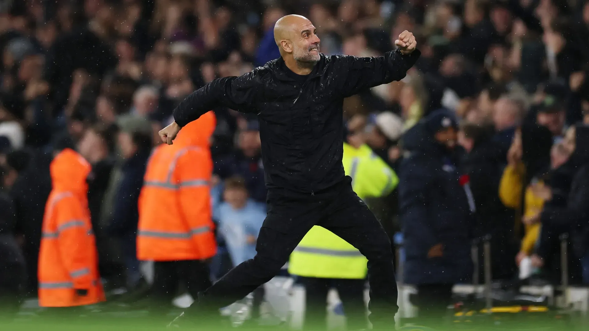 Pep Guardiola, Manager of Manchester City, celebrates his team's first goal vs. Liverpool.