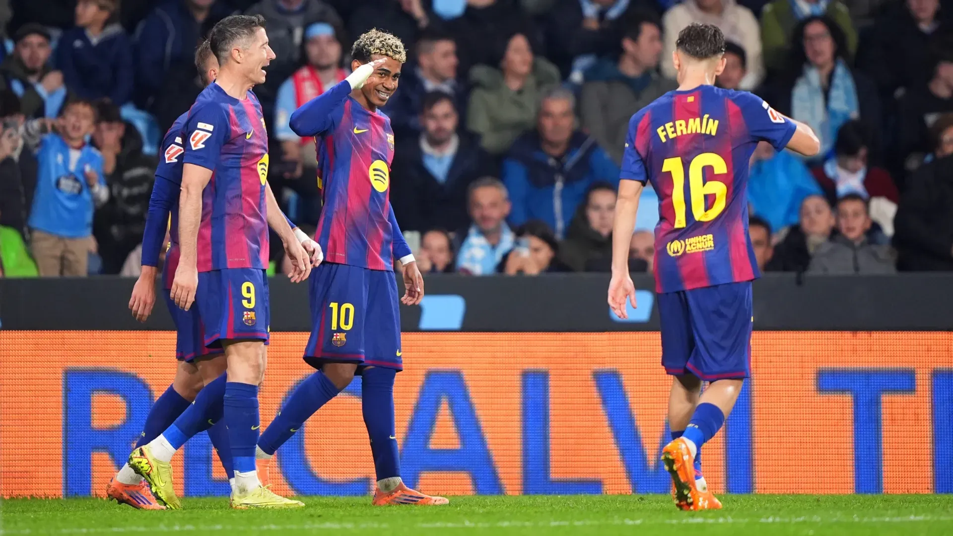 Lamine Yamal of FC Barcelona celebrates scoring his team's third goal against Celta de Vigo.