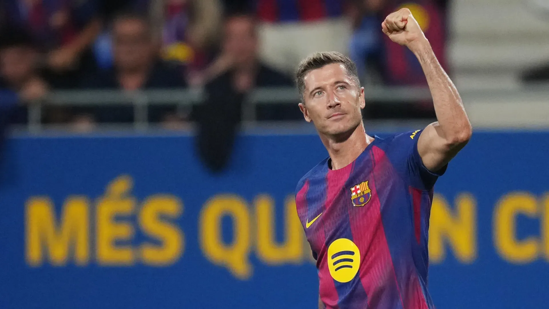 Robert Lewandowski of FC Barcelona celebrates scoring against Valencia.