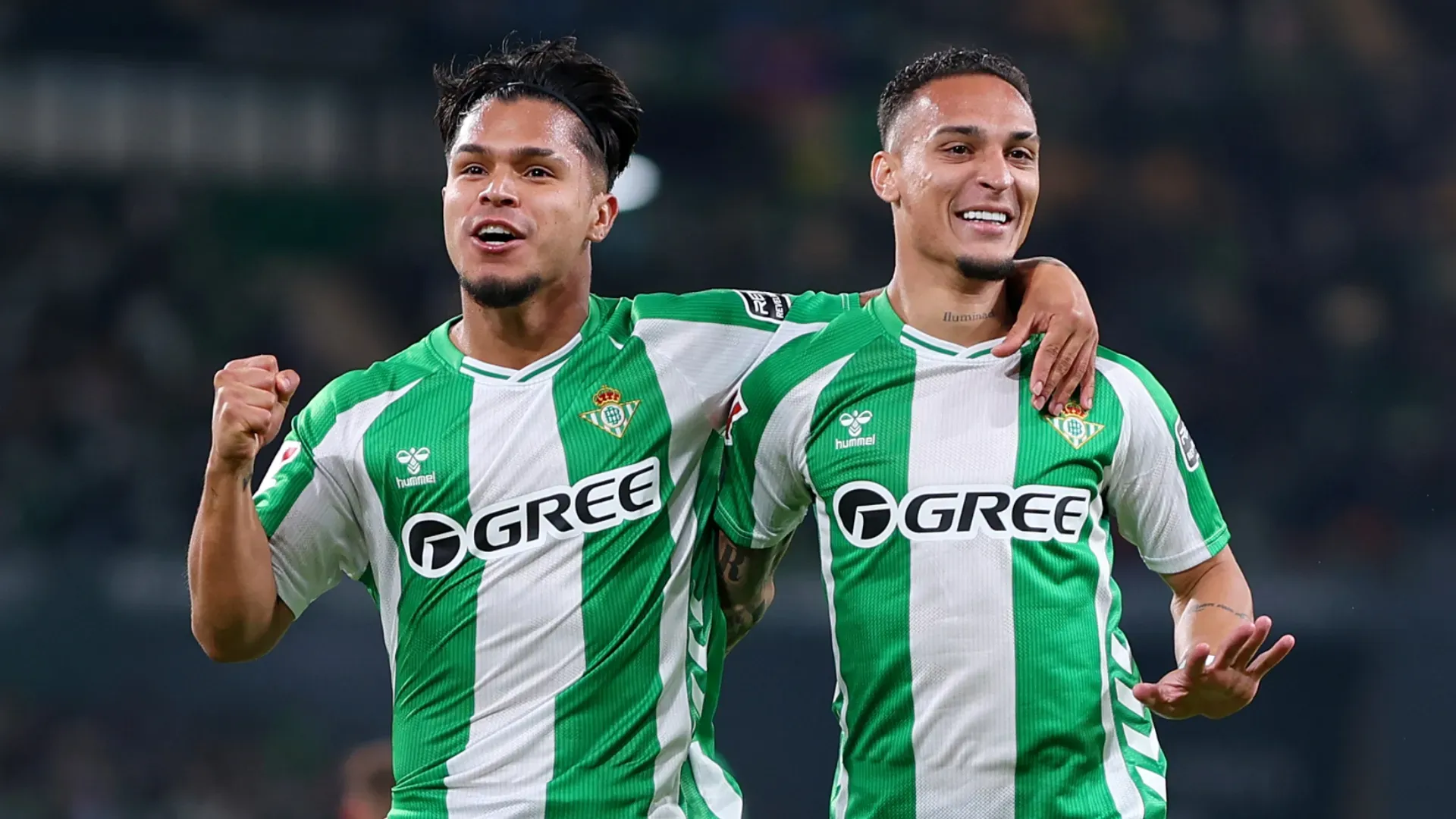 Antony of Real Betis celebrates with teammate Cucho Hernandez.