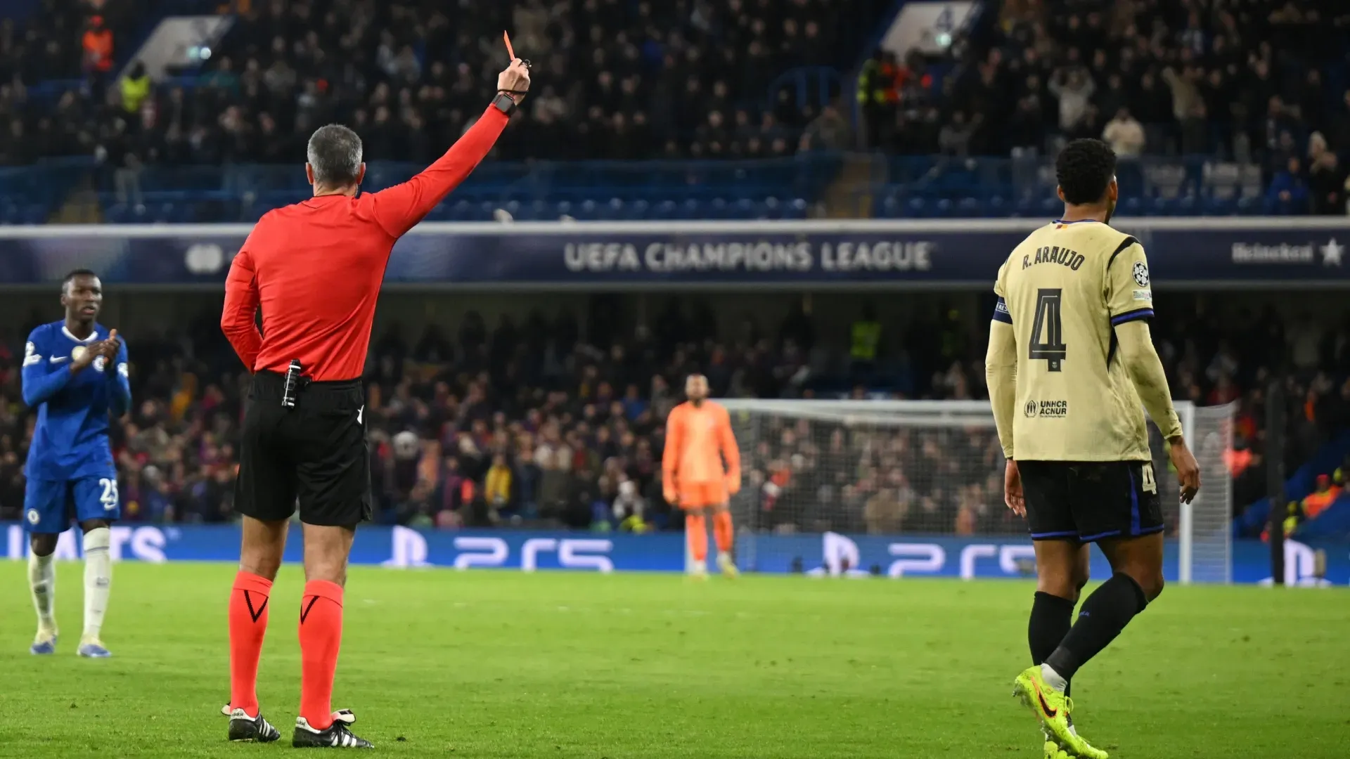 Ronald Araujo of FC Barcelona is shown a red card by referee Slavko Vincic during the UEFA Champions League game against Chelsea.