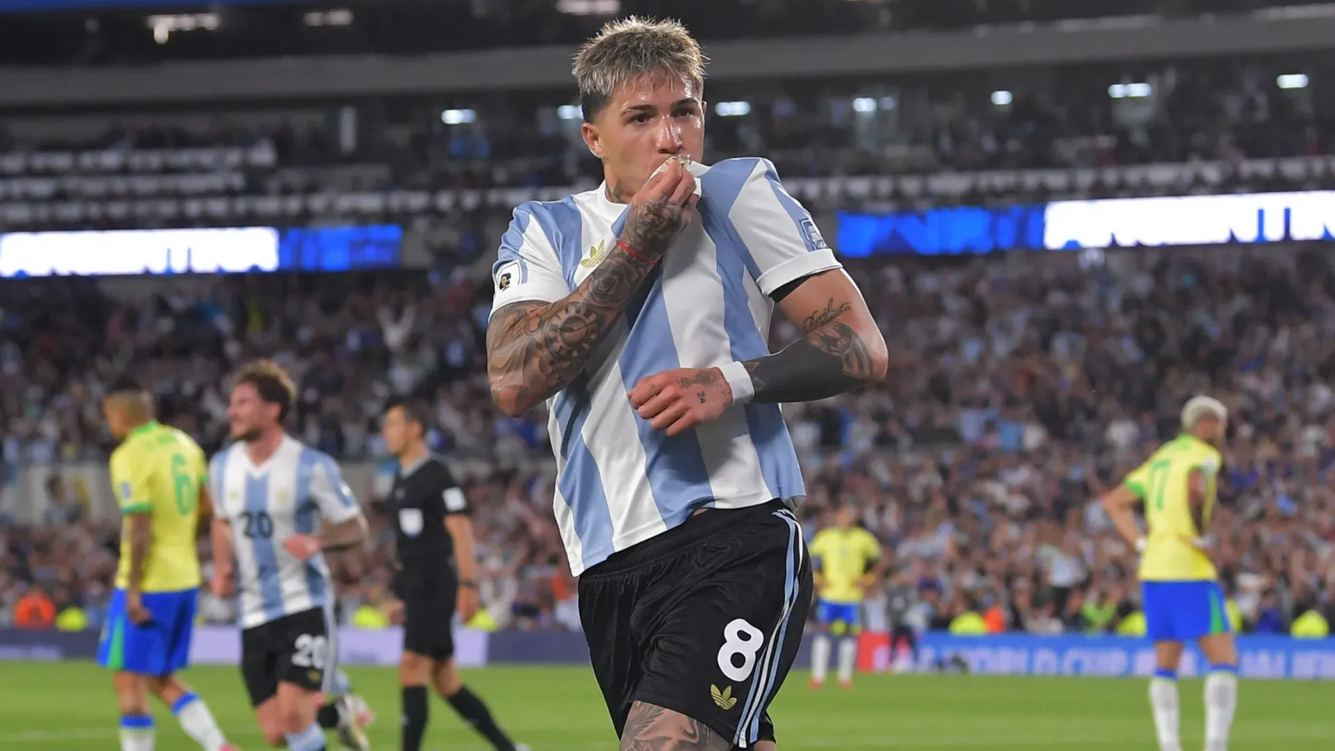 Enzo Fernández of Argentina celebrates after scoring against Brazil.