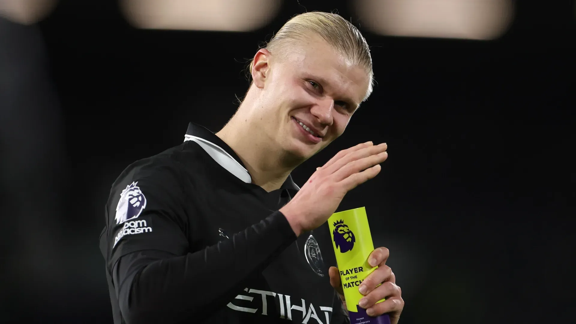 Erling Haaland of Manchester City holds the Premier League Player of the Match against Fulham.