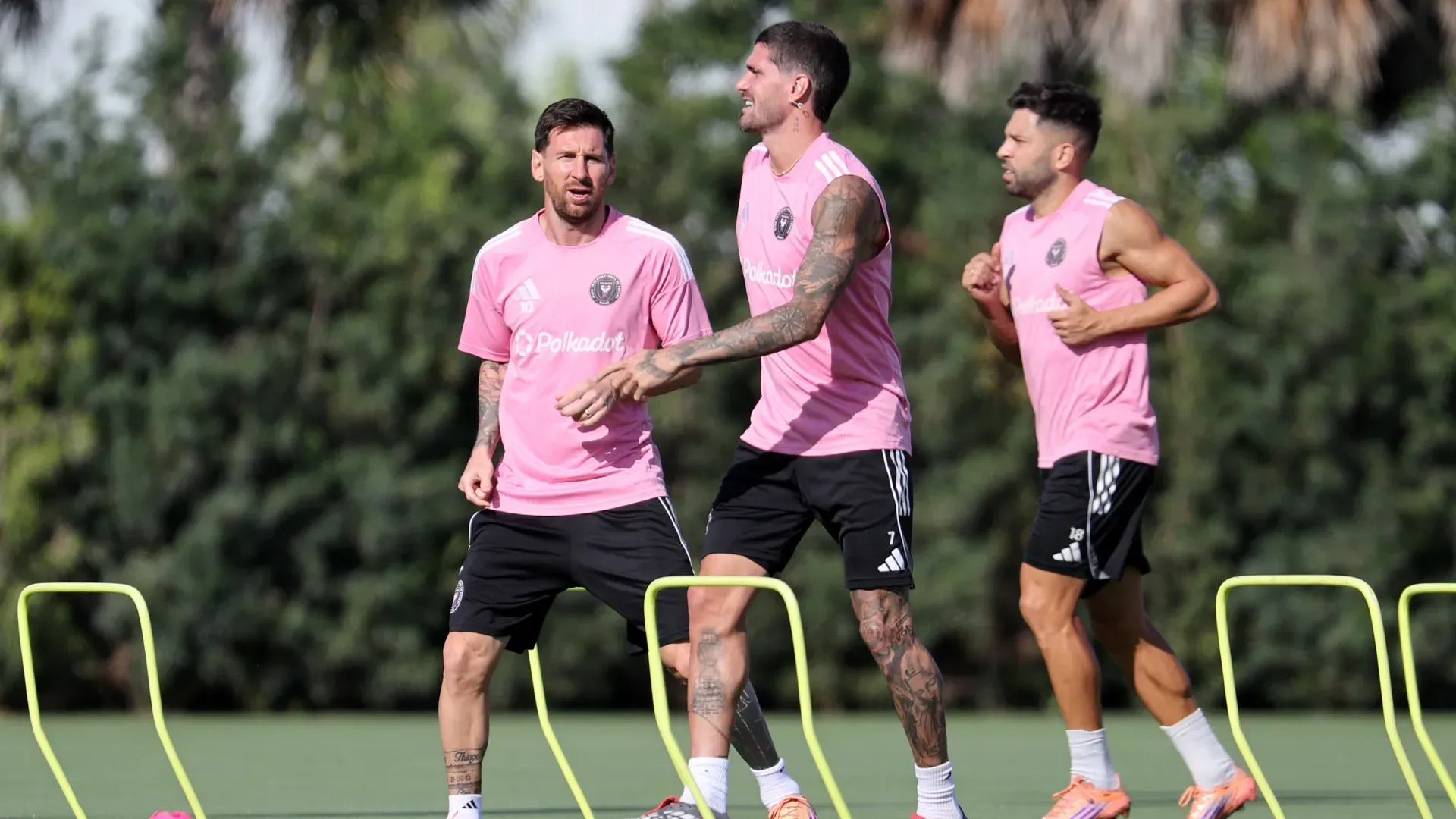 Lionel Messi #10, Rodrigo De Paul #7 and Jordi Alba #18 of Inter Miami CF warm up during a training session.