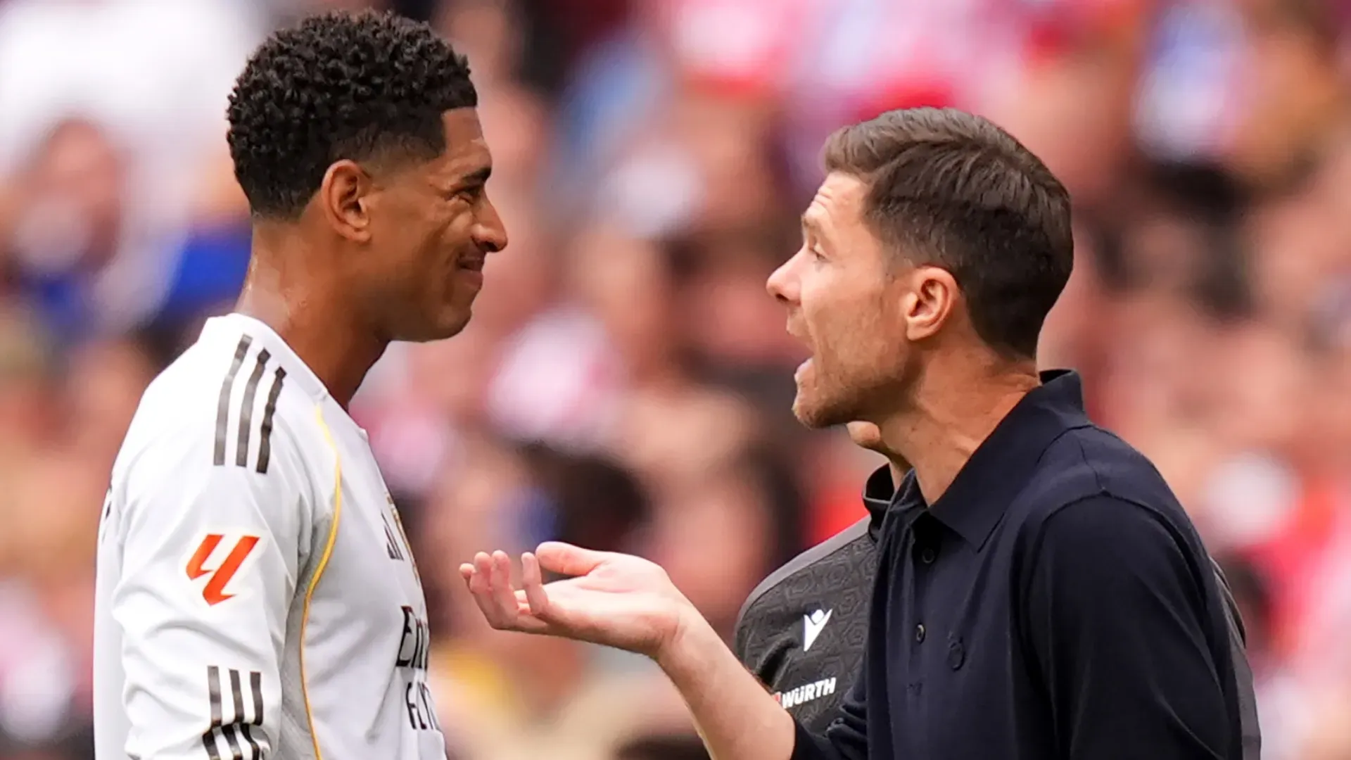 Real Madrid's Jude Bellingham and Xabi Alonso