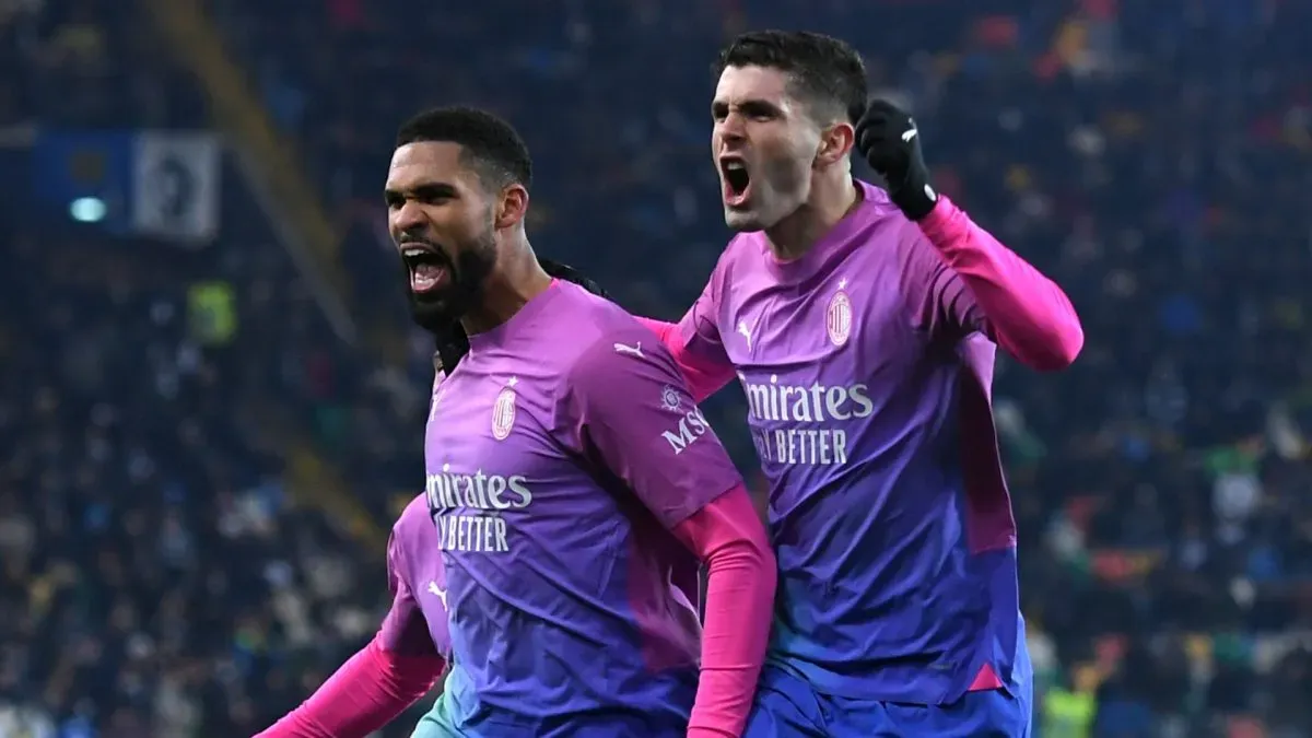 Ruben Loftus-Cheek of AC Milan celebrates with teammate Christian Pulisic.