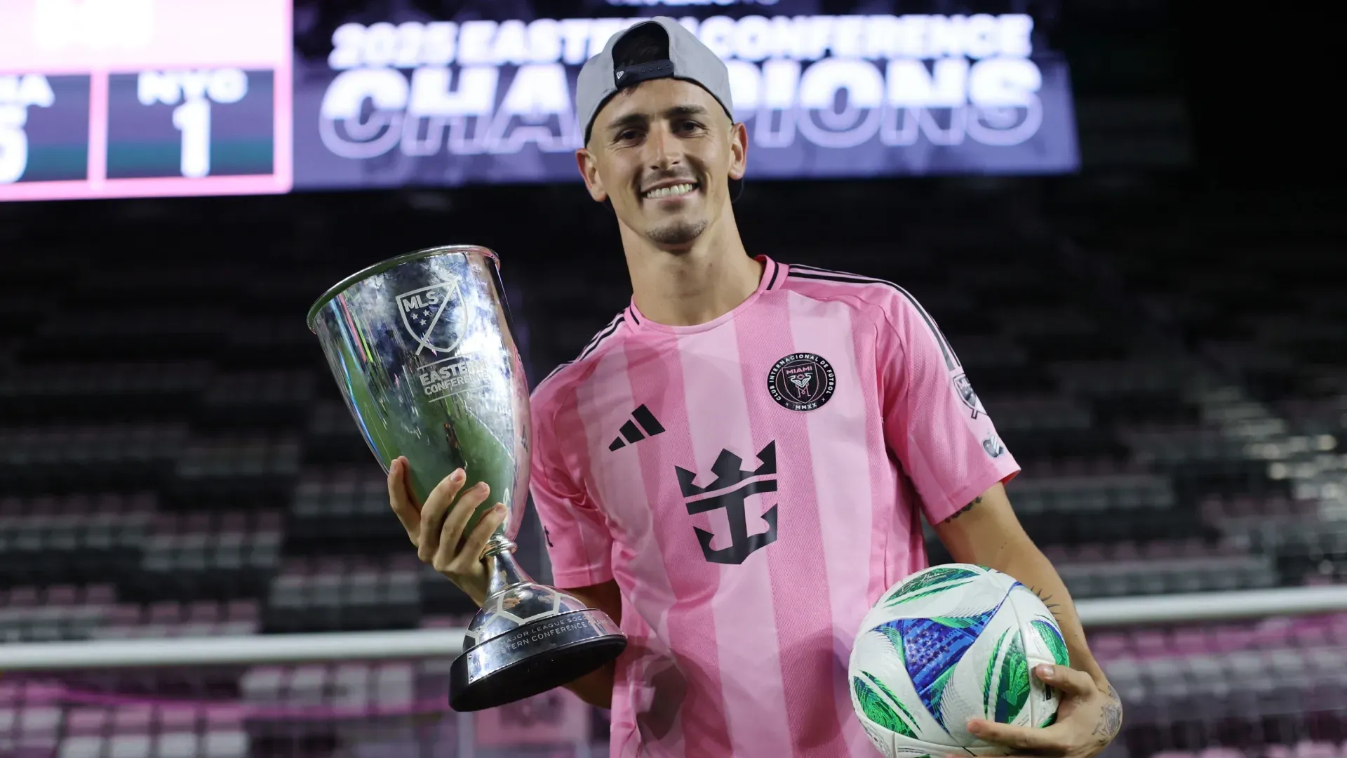 Tadeo Allende #21 of Inter Miami CF celebrates with the 2025 MLS Cup eastern conference trophy.