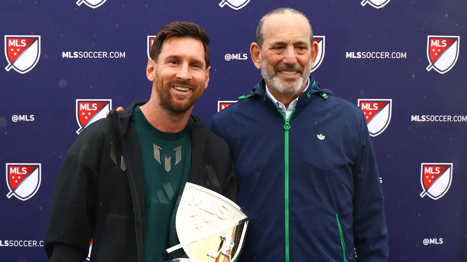 Lionel Messi #10 of Inter Miami CF and MLS Commissioner Don Garber pose for a photo with the 2025 Landon Donovan MLS MVP trophy.