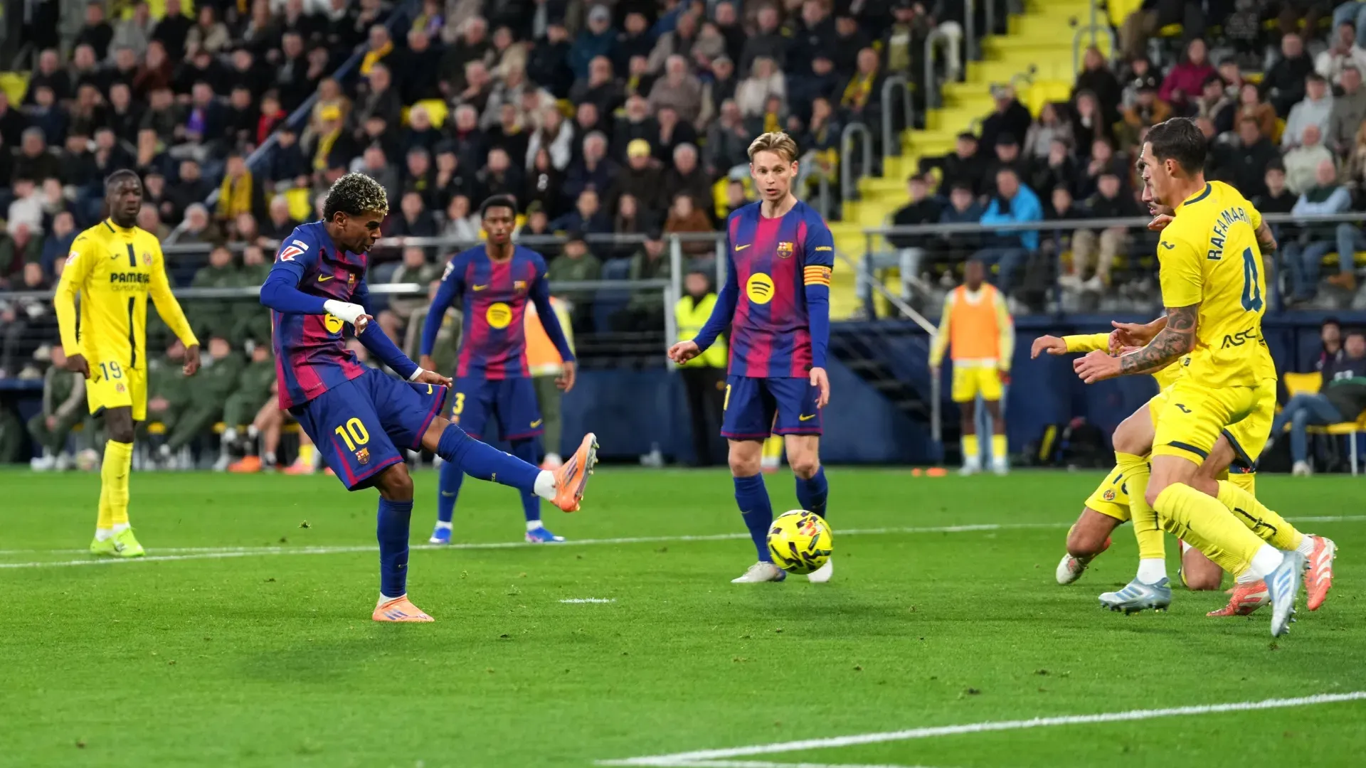 Lamine Yamal of FC Barcelona scores his team's second goal against Villarreal.