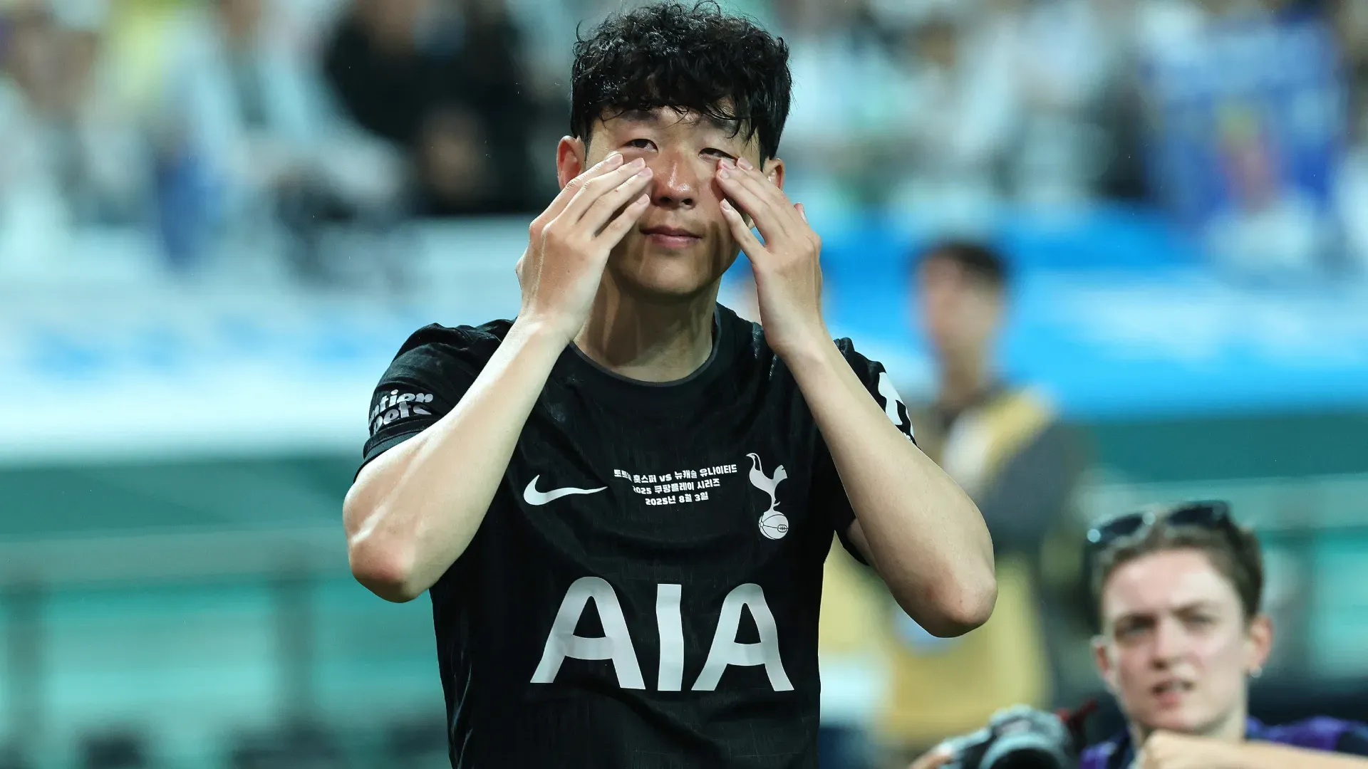 Heung Min Son of Tottenham Hotspur wipes away his tears during the pre-season friendly between Tottenham Hotspur and Newcastle United.