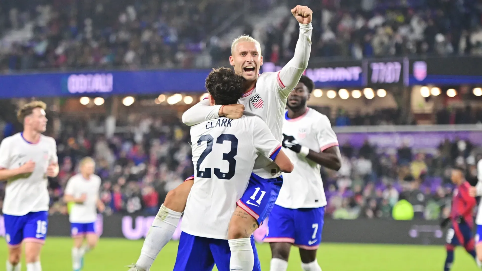 Caden Clark #23 of United States celebrates with Matko Miljevic #11 after scoring.