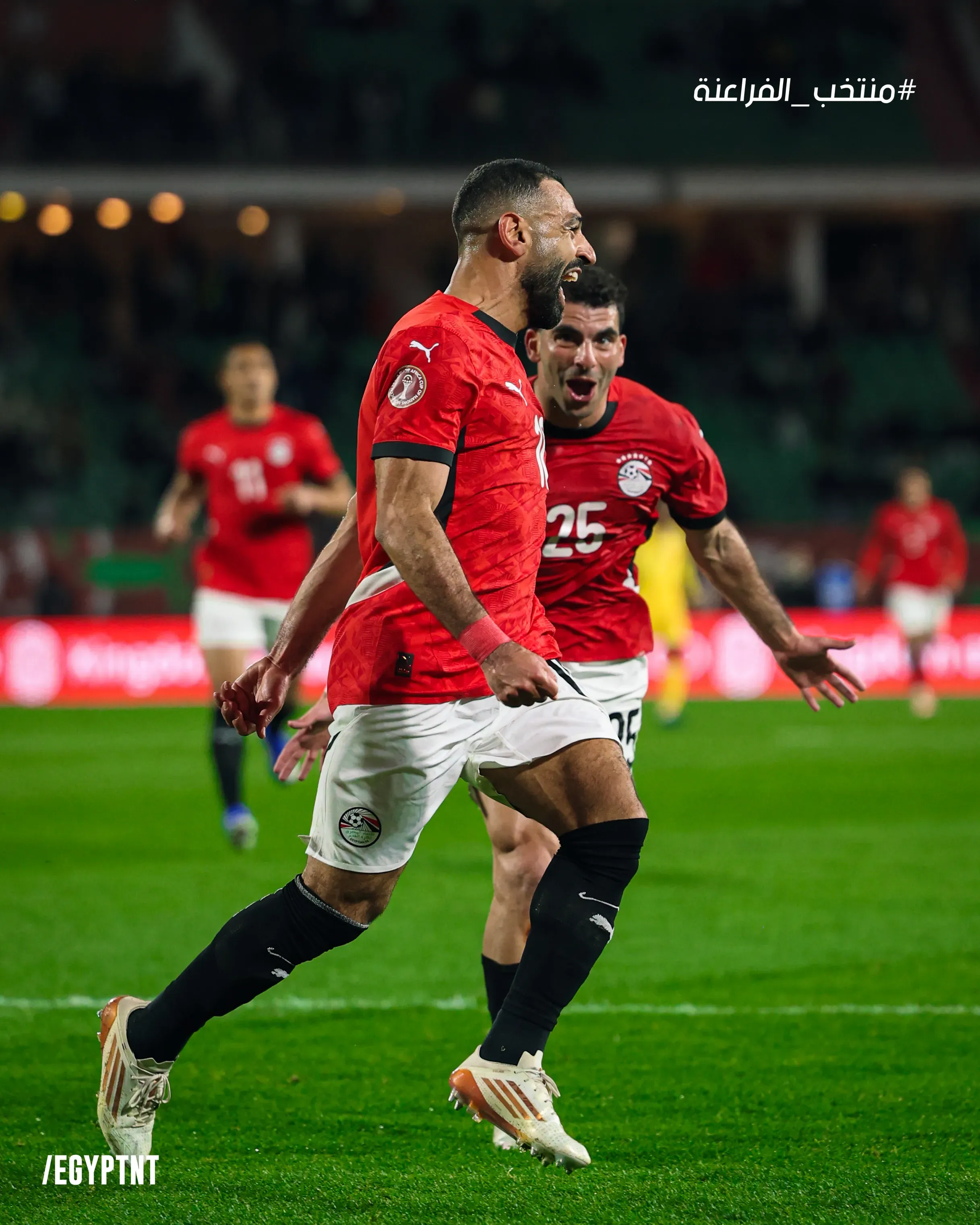 Mohamed Salah celebrating after scoring against Benin.